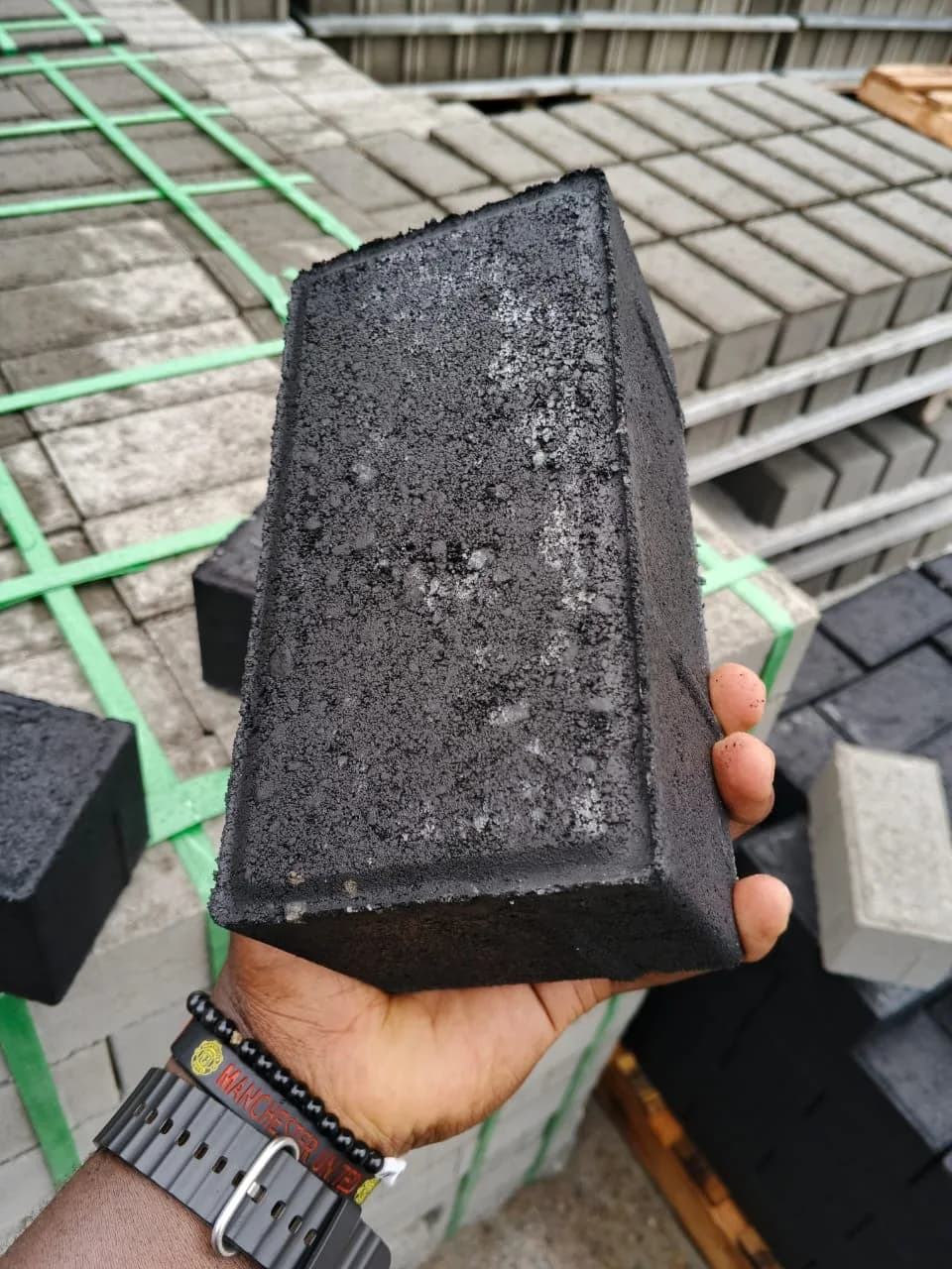 Rectangular compound pavers laid in a bond pattern